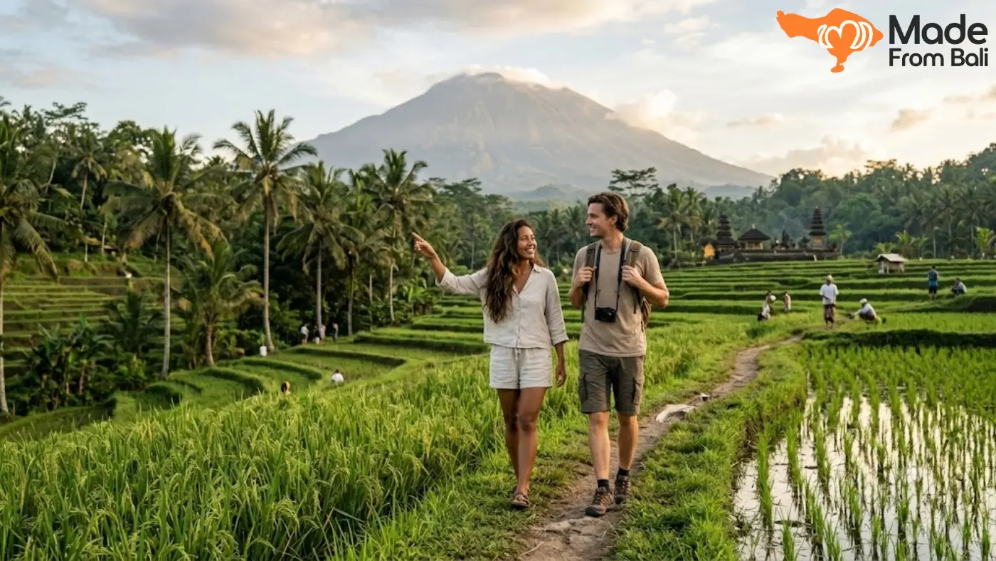 Travelers walking through Bali rice terraces with Mount Agung, showing experiences that influence trip length decisions.