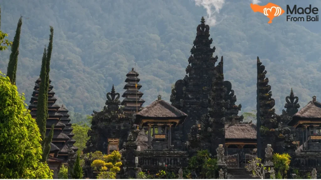 Traditional Balinese temple complex with stone gates and shrines, a landmark for first-time visitors.
